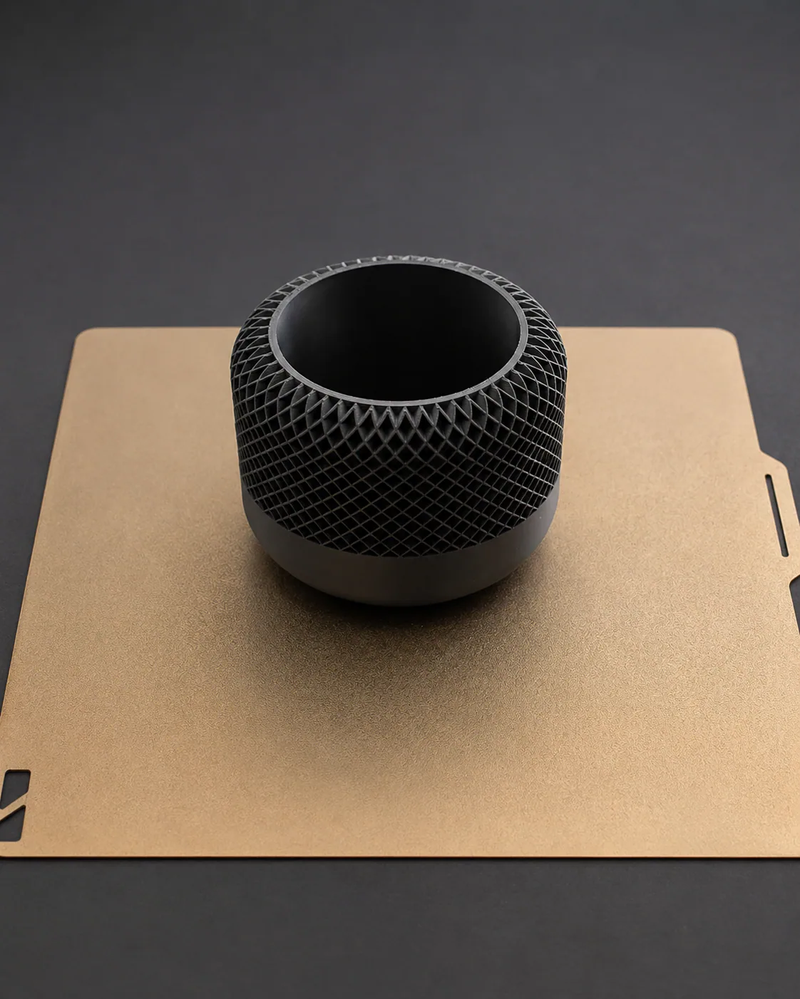 Black 3D printed cylindrical container with an open diamond lattice surface